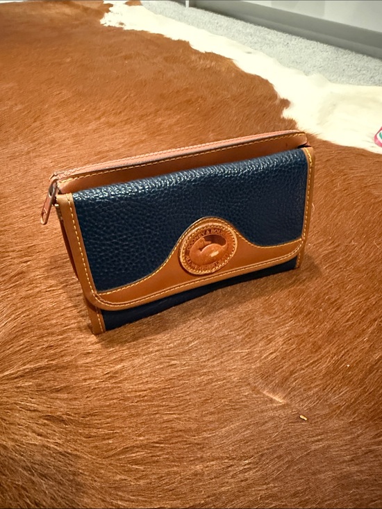 Dooney & Bourke Handbags - Dooney & Bourke Navy and Tan Pebbled Leather Zip Wallet